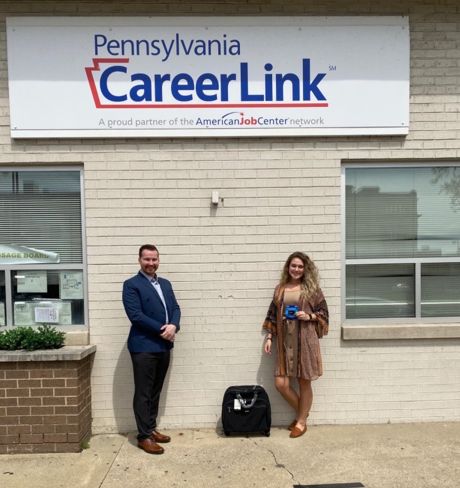 Man and woman standing in front of PA CareerLink office